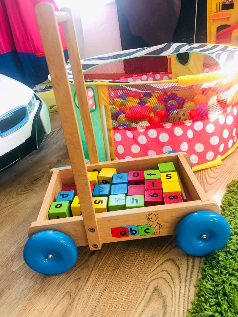 wooden walking trolley with blocks